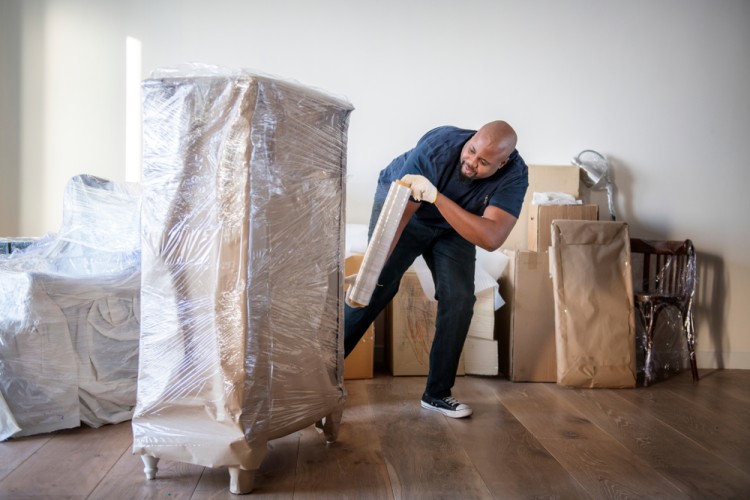 Removalist packing home furniture